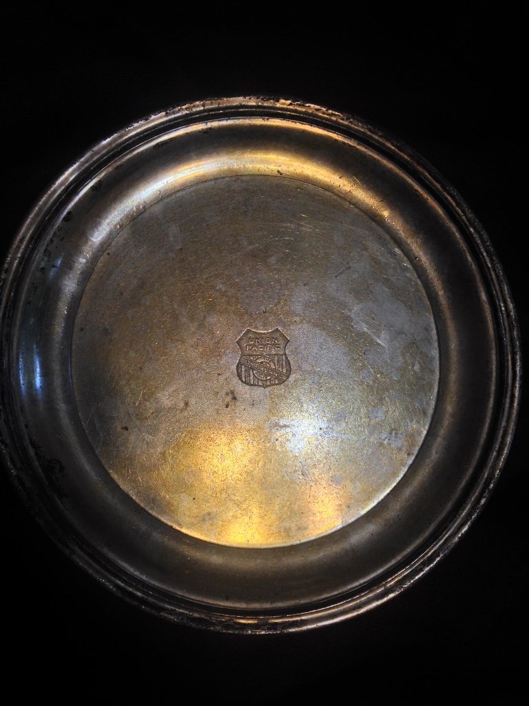 Union Pacific Silverware Plate from Early 1900s Silver: Very unique and rare Union Pacific Silver Soldered Plate with the logo right in the center. Reverse has makers mark and info. Overall very good condition, a great piece for anyone who collects Train i