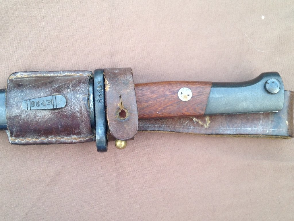 World War 2 Era Mauser Bayonet: CZ Army issued German Design Mauser Bayonet with leather frog. In excellent condition. Blade remained oiled, sharp and well cared for. Numbers Matching, makers mark on blade. Overall Superb Condition.