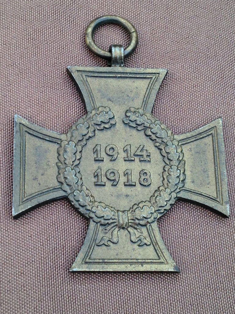 Hindenburg Cross WWI German Medal pre WW2: World War One 1914 1918 dated German Hindenburg cross without swords. No ribbon but loop still attached. Makers mark on reverse.