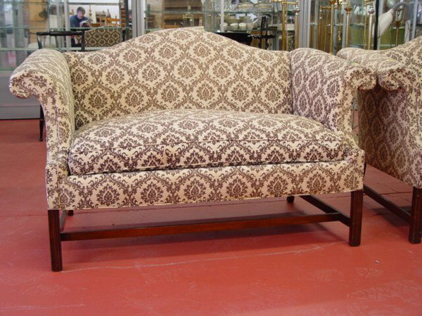 Pair of Chippendale Style Upholstered Camel Back: Pair of Chippendale Style Upholstered Camel Back Settees (H: 2'10" x L: 4'8" x W: 2'8")BUYER MUST ARRANGE & PAY OWN SHIPPING. PLEASE E-MAIL US FOR A LIST OF SHIPPERS.