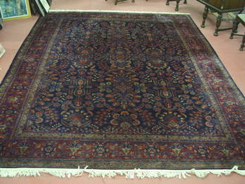 1141: A Sarouk Carpet 13'5" x 10'4"