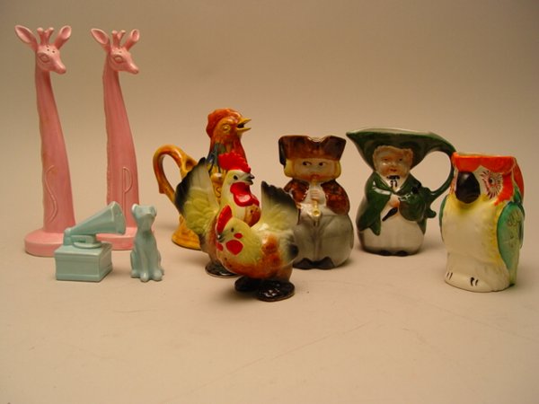 A Collection of Salt & Pepper Shakers: A Collection of Salt & Pepper Shakers, creamers and decorative baskets.