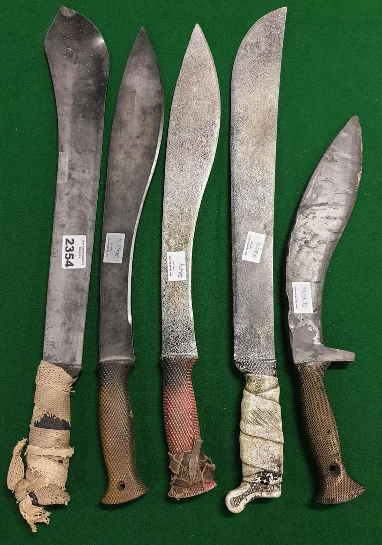Five Machetes used in various series and scenes. (not: Five Machetes used in various series and scenes. (not metal) (5) (24) AP 35.
