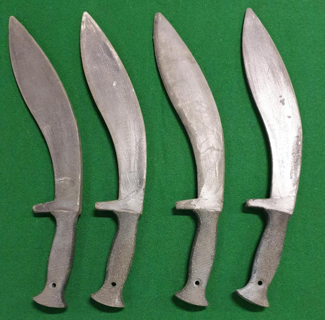 Four Loyalist carved Machetes.(Prop)(AP 165).: Four Loyalist carved Machetes.(Prop)(AP 165).