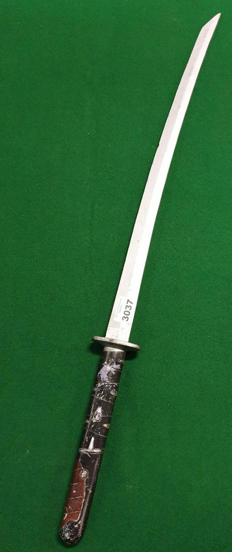 SUNNY IS PLAYED BY DANIEL WU. Sunny's Black Wind Sword: SUNNY IS PLAYED BY DANIEL WU. Sunny's Black Wind Sword (prop). (AP02)