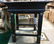 An old pine Table along with an unusual metal Table and