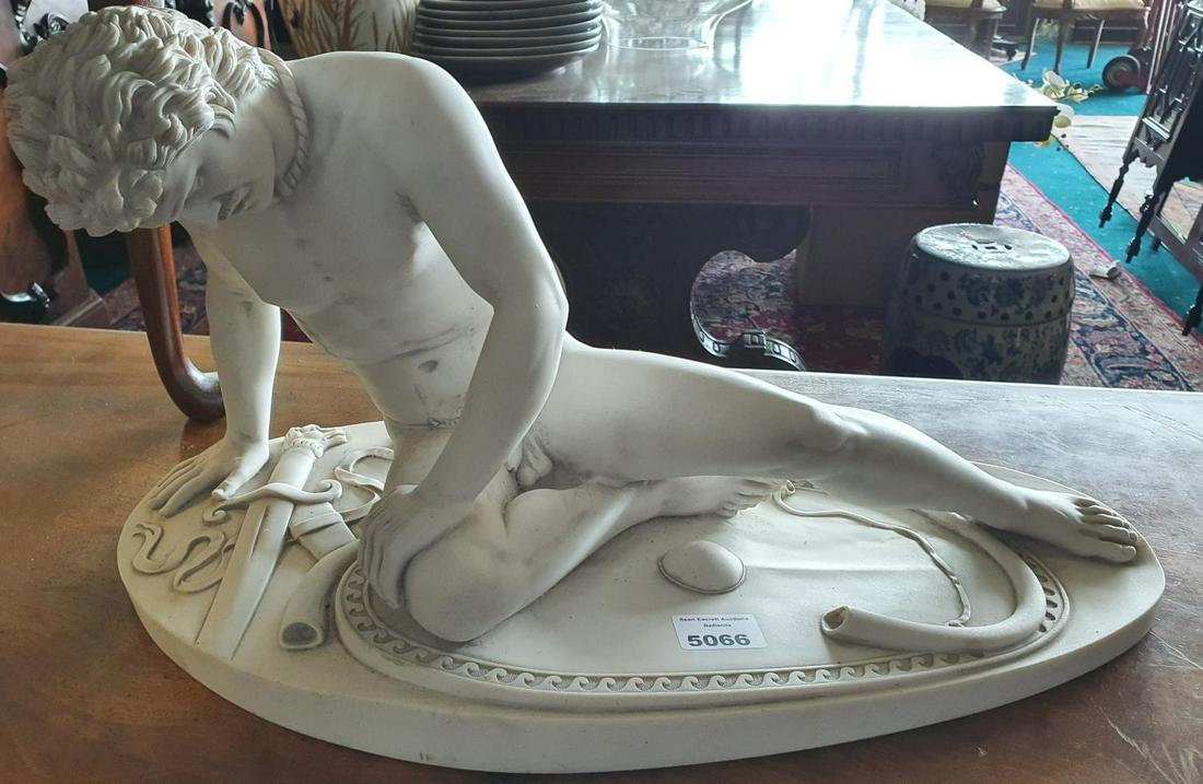 A Parian Figure of a young Greek/Roman boy. (1)(17): A Parian Figure of a young Greek/Roman boy. H 29cm x 57cm W approx. (1)(17)