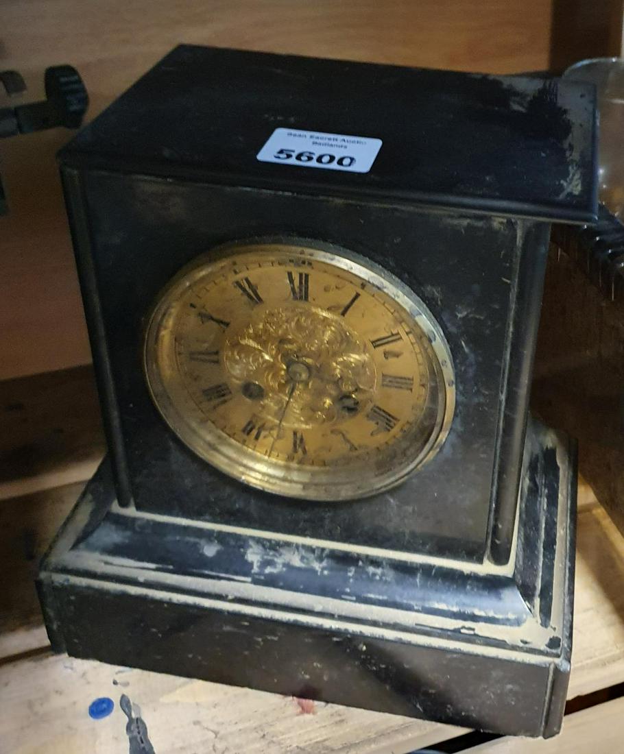 A 19th Century Black Slate Mantle Clock along with a: A 19th Century Black Slate Mantle Clock along with a Royal Typewriter. H24cm approx.(1)(1).