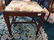 A Georgian Mahogany Stool with stretcher base.