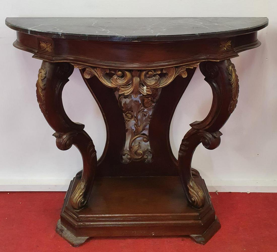 A good pair of late 19th Century Timber and Gilt: A good pair of late 19th Century Timber and Gilt Console Tables with marbleised timber tops.103w x 43d x 79h cms.