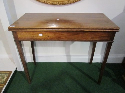 A Georgian Mahogany Fold Over Tea Table.: A Georgian Mahogany Fold Over Tea Table.