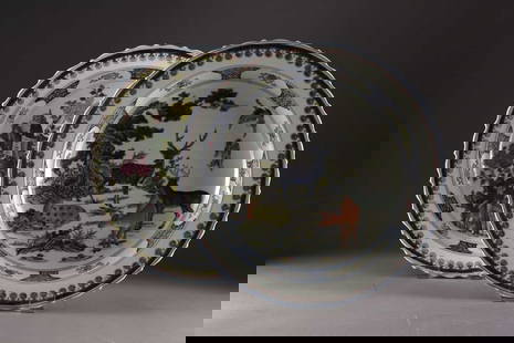 A large pair of Chinese famille verte dishes, Kangxi marks but later: A large pair of Chinese famille verte dishesKangxi six-character marks but 20th centuryWith barbed rims, finely painted in colours, one with a scene of pheasants perched on rocks amid flowering peonie