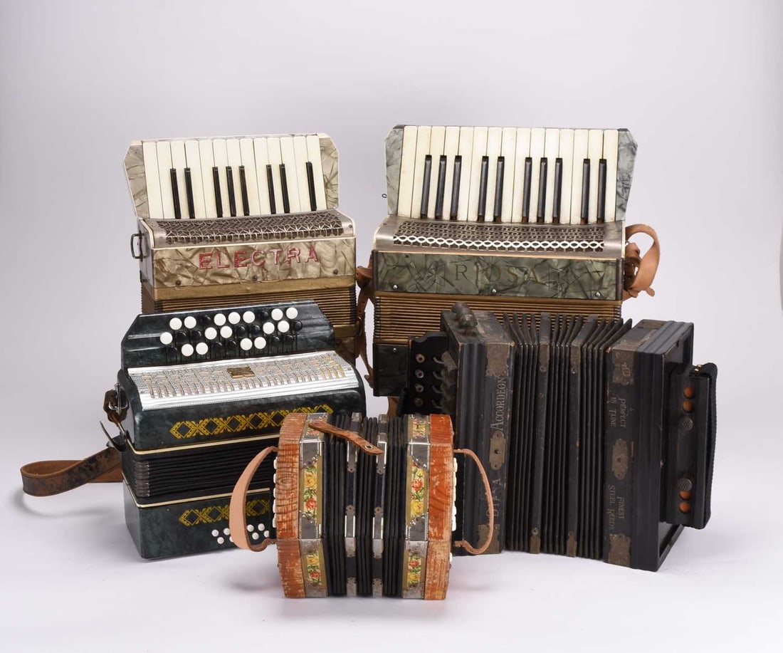 A group of accordions (7) and related items (for restoration and repair): A group of accordions and related items (for restoration and repair)Including a Diana Accordeon (made in Germany), a Russian Manbiw accordion, a Hohner Verdi III accordion in its case, a Riosa accordi