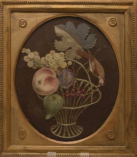 A Victorian felt and needlework still life panel: A Victorian felt and needlework still life panelDepicting a bird perched on the handle of a fruit basket, wool cloth with felt appliqu&#233; and embroidery, in a glazed gilt frame.Frame 48cm x 42cm