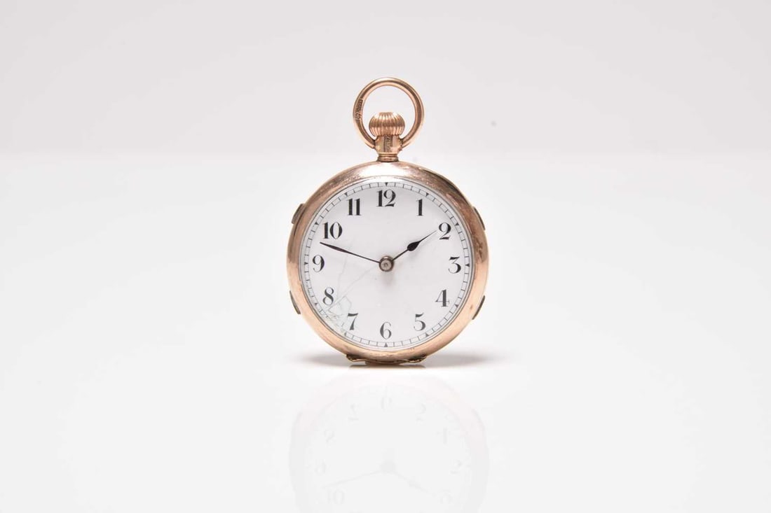 A lady's 9ct gold open face fob watch (1 of 3)