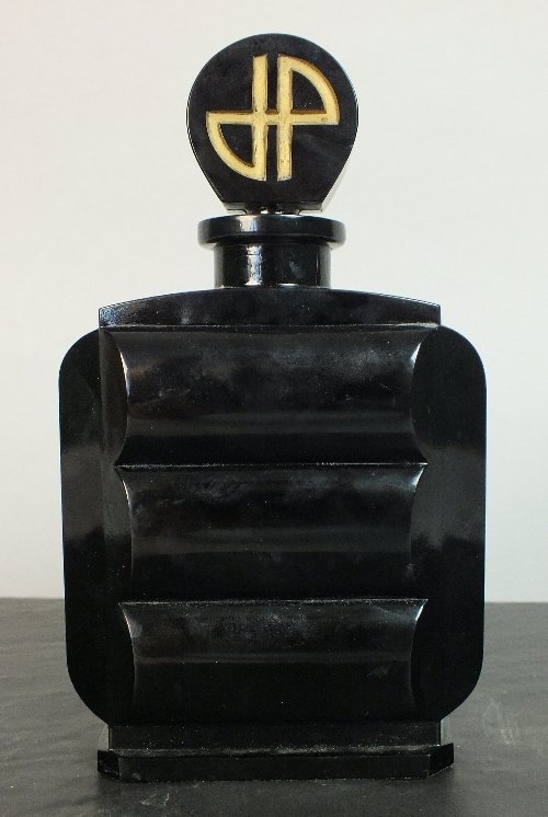 Halls Summer Collective Auction 21st August: An Art Deco Jean Patou perfume decanter and stopper, attributed to Louis Sue, black section body, stopper with gold JP initials, inscribed Jean Patou Paris to base, 19cm high