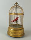 An early 20th century singing bird in cage automaton,