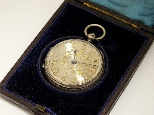 A lady's silver cased fob watch, hallmarked London: A lady's silver cased fob watch, hallmarked London 1874, the decorative silver dial with gold Roman numerals and floral decoration, the gilt movement signed 'Eliz Priest Coleshill 1875 No. 6011', with