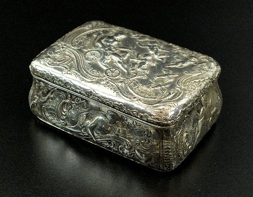 A continental silver Bombe box, Berthold Muller, import: A continental silver Bombe box, Berthold Muller, import mark for London 1896, of rectangular form with embossed figural scenes of Venus and Cupid, 8.5cm wide, weight 3.6oz