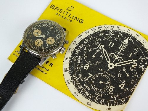A Gentleman's stainless steel Breitling Navitimer: A Gentleman's stainless steel Breitling Navitimer Chronograph wristwatch, the black dial with three subsidiary dials, bi-directional bezel, attached black leather strap, with original instruction leaf