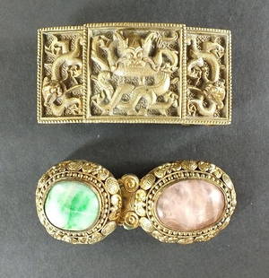 A Chinese belt buckle in archaic style, of rectangular: A Chinese belt buckle in archaic style, of rectangular form, with dragon decoration within square borders, 7cm long, and another Chinese belt buckle, with rose quartz and jadeite oval cabochons set wi