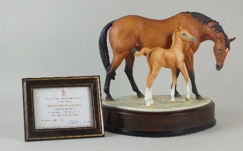 A Royal Worcester 'Prince's Grace and Foal' group,: A Royal Worcester 'Prince's Grace and Foal' group, modelled by Doris Lindner, limited edition 26/750, mounted on a wooden plinth base, with signed certificate, 25cm high