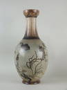 A Martin Brothers stoneware vase, dated 1887, incised