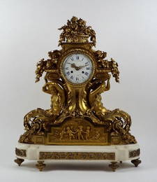 A French mid-19th century ormolu figural mantel clock