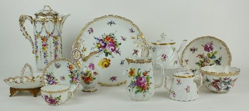 Fine Furniture, Euopean Ceramics & Works of Art: A matched German porcelain part tea service, 20th century, comprising Potschappel and Dresden examples, printed and painted with naturalistic floral sprays, the set to include a twin handled dish, 27.