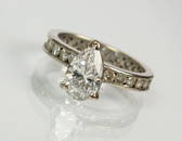 A pear shaped solitaire diamond ring, the pear shaped