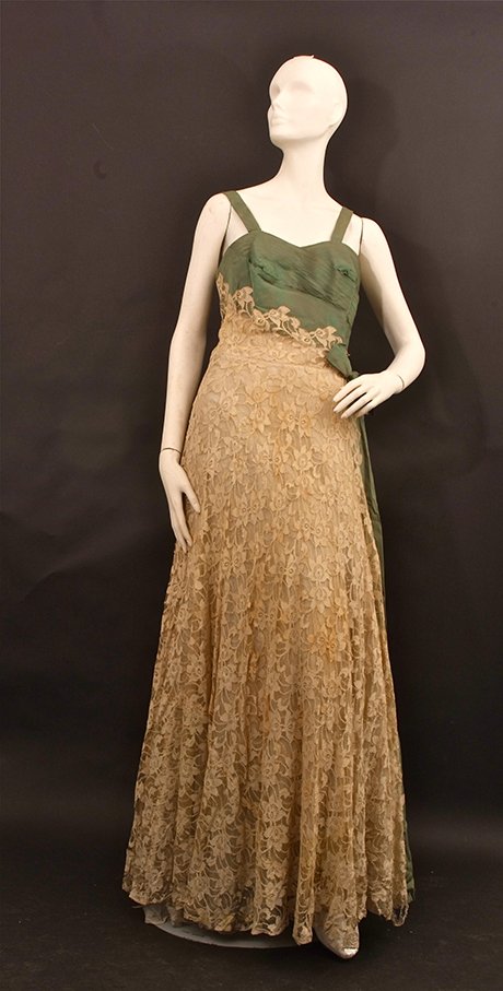 A Quantity of Vintage Dresses .A stunning 1930's lace: A Quantity of Vintage Dresses .A stunning 1930's lace ballgown. Edwardian skirt and bodice with detailed trim, sleeves need to be attached and other pieces. A 1940's soft lime green parachute silk eve