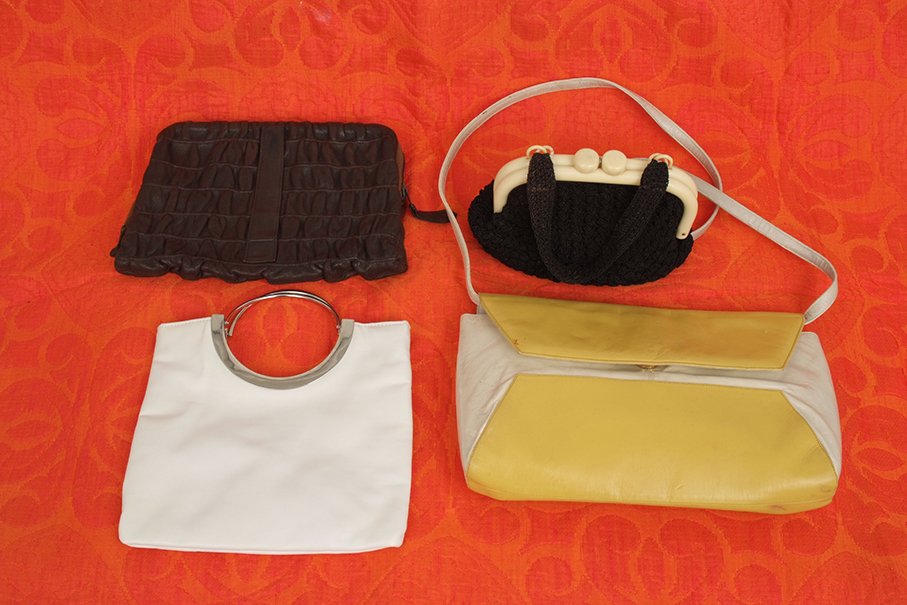 Four Summer Handbags. A Charles Jourdin leather yellow: Four Summer Handbags. A Charles Jourdin leather yellow and white shoulder bag. A little 60's white leather bag with chrome handles lined in white with a zip pocket. A rouched soft brown leather zipped