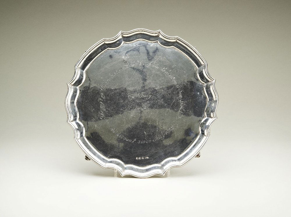 A Roberts & Dore Ltd hallmarked silver salver (792g),: A Roberts & Dore Ltd hallmarked silver salver (792g), engraved 'The gift of Westminster Bank to John Lenanton & Son, Limited, 3rd July 1964, In account since July 1864', scrolling edge on bun feet, 30