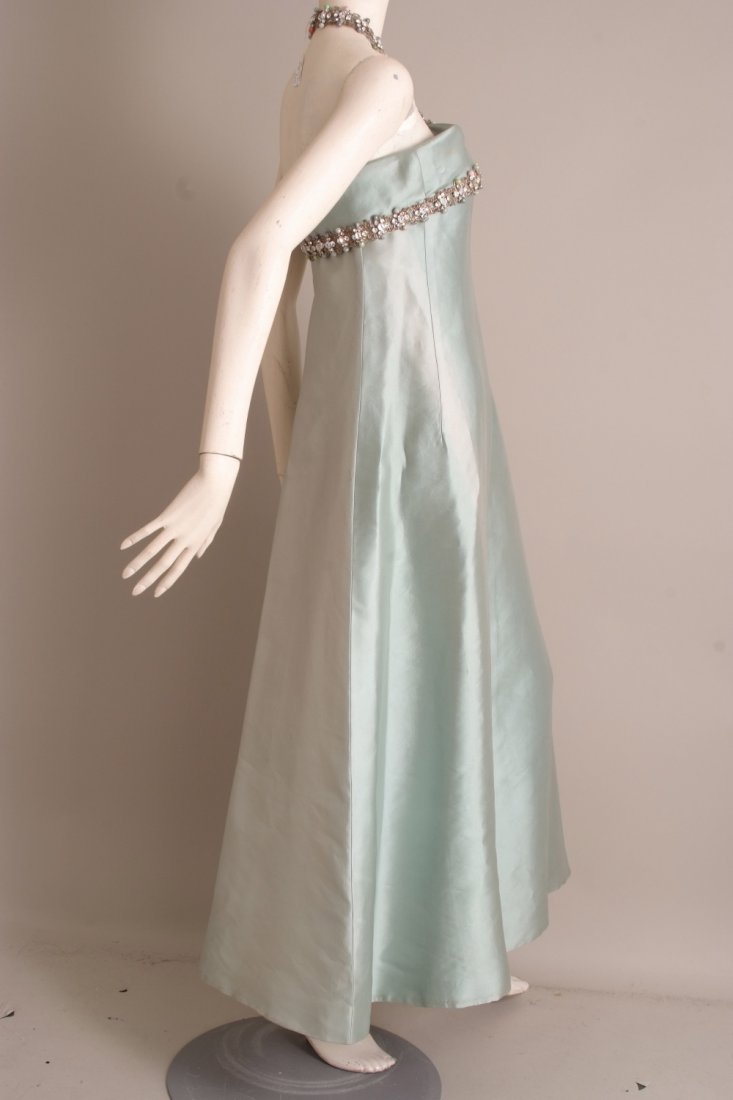 1950's Jacques Heim haute couture ball gown. This: 1950's Jacques Heim haute couture ball gown. This beautiful soft silver blue grosgrain satin dress, gives off a wonderful sheen in the light. The inner bodice has been boned and structured to hold the