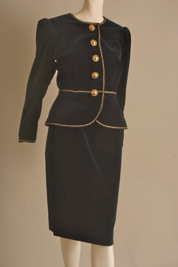 1990's Yves St Laurent Rive Gauche velvet skirt and: 1990's Yves St Laurent Rive Gauche velvet skirt and jacket suit. Ambassadorial, dark blue with gold buttons and trim. A tailored jacket with nipped waist, tapering sleeves with gold buttons at the cuf