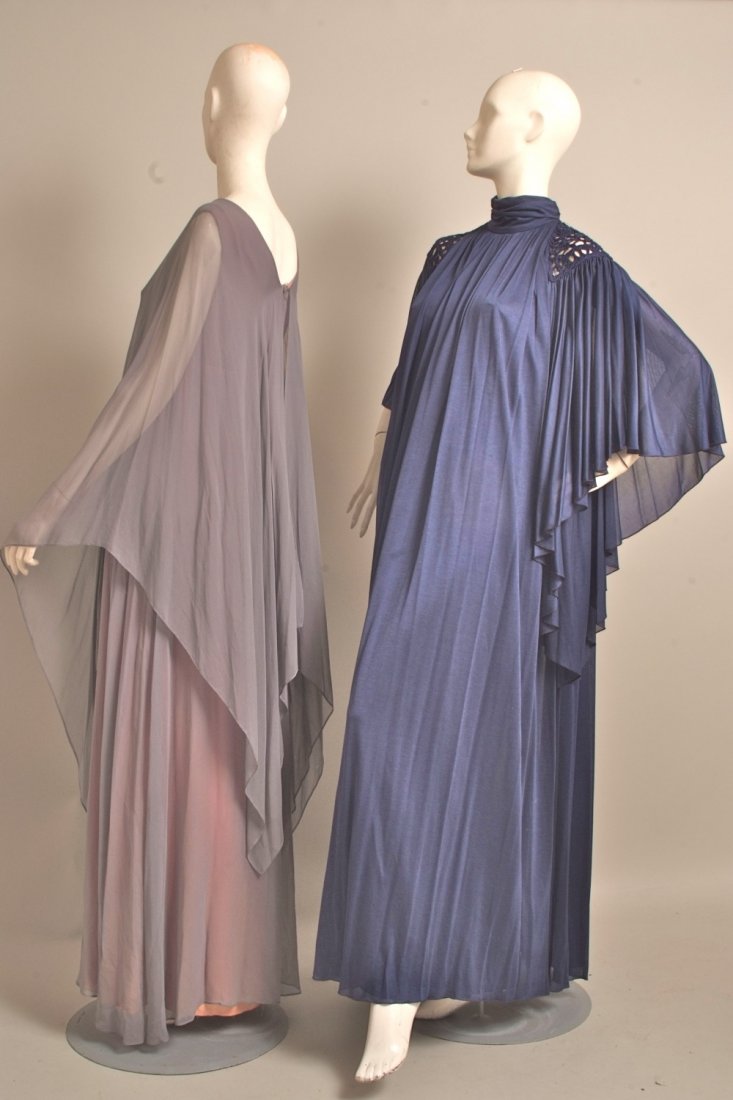 A collection of 1970's Evening dresses. 1970's 'John: A collection of 1970's Evening dresses. 1970's 'John Charles, London'. Blue silky long dress with crocheted detail on shoulders and fanned sleeves. Size 10/12. A 1970's 'Roland Klein at Marcel Fenez',