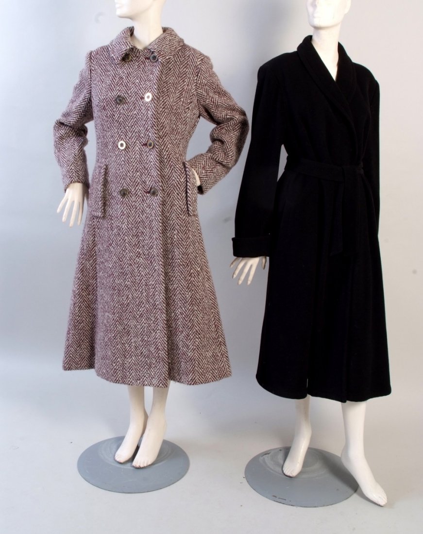 An Aquascutum Tweed Coat. Herringbone all wool tweed: An Aquascutum Tweed Coat. Herringbone all wool tweed coat, with double breasted buttons deep pockets, fully lined. Size 10 A further Black Wool 'Rodier' Coat. A smart black wool mixed with cashmere wi
