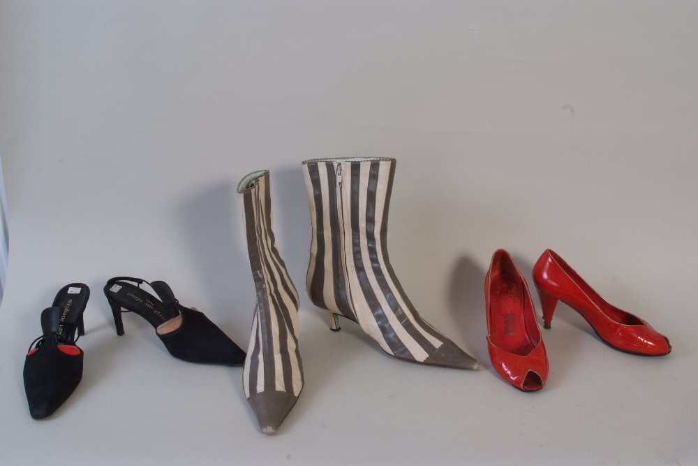 A quantity of designer boots and shoes. To include a: A quantity of designer boots and shoes. To include a pair of stripey boots 'Emma Hope' for Paul Smith Size 6. 2 pairs of 'Robert Clergerie' sandals Size 6. A pair 'Charles Jourdin' sandals Size 6. A p