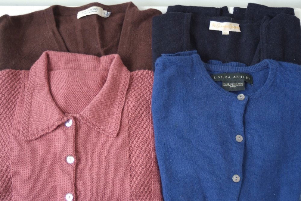 3 x Cashmere Cardigans. A black 'cashmere company': 3 x Cashmere Cardigans. A black 'cashmere company' cardigan. A 'lochmere' brown cardigan and a blue 'laura ashley' cardigan. A further handknit musk pink woollen cardigan. Sizes S. (4)