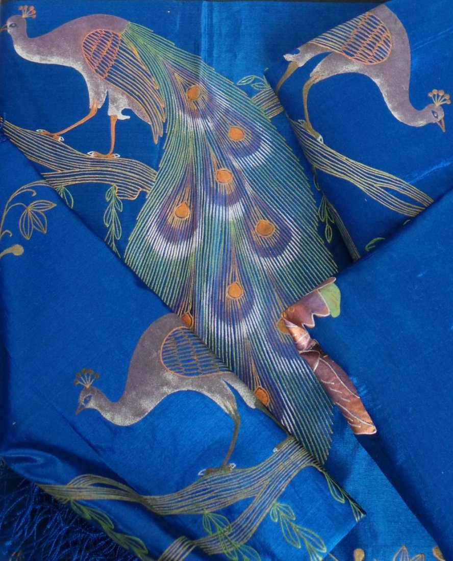 A lot of vintage blue silk printed fabrics . A runner,: A lot of vintage blue silk printed fabrics . A runner, a small table cloth and two cushion covers all printed with flowers and cranes. (4)