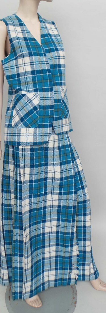 A vintage wool maxi kilt and waistcoat labelled 'Laird: A vintage wool maxi kilt and waistcoat labelled 'Laird Portch' of Scotland. Good condition - approx size 12. (2)