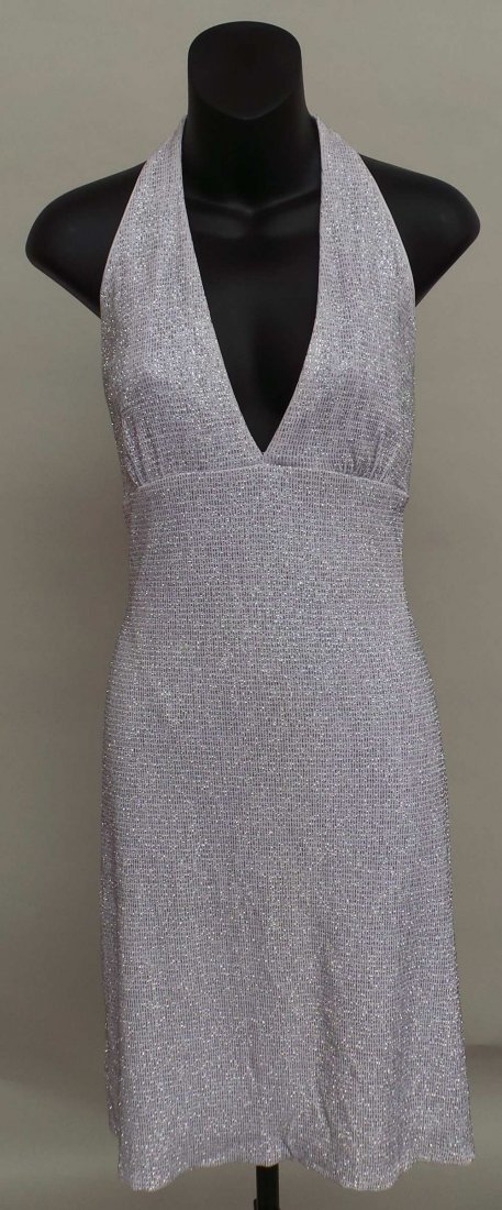 A vintage 70's American white and silver lurex mini: A vintage 70's American white and silver lurex mini halter dress labelled 'Scott McClintock. Size 14.