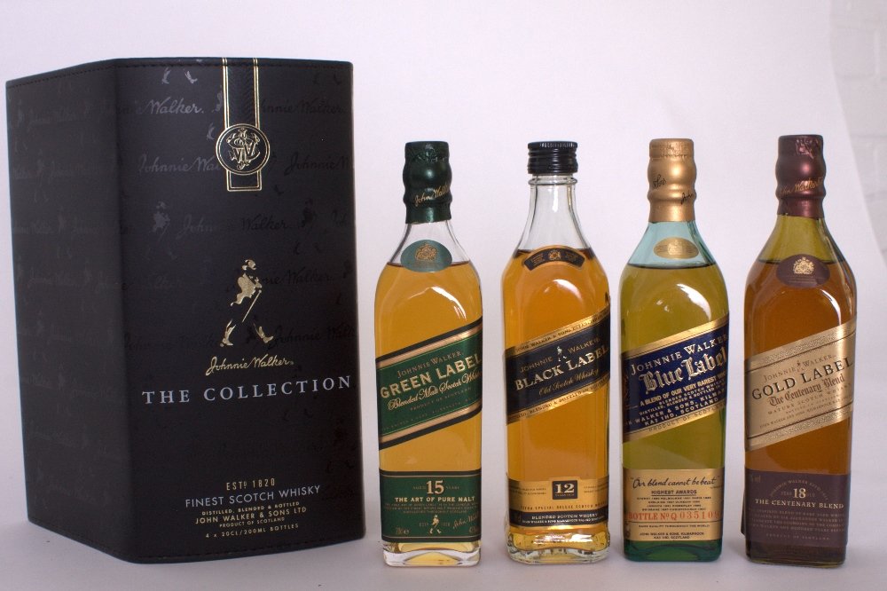 Johnnie Walker -A set of four 20cl bottles from Johnnie: Johnnie Walker -A set of four 20cl bottles from Johnnie Walker's old range - a rare chance to try the excellent Gold Label 18 Year Old and the 15 Year Old Green Label, now discontinued outside Taiwan 