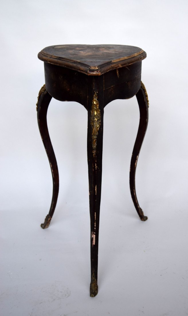 A Louis XV style Vernis Martin work table heart shaped: A Louis XV style Vernis Martin work table heart shaped with a swing drawer on cabriole legs applied with gilt metal mounts and painted with cherubs (distressed) 20cmW