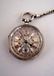 A late Victorian pocket watch with silver and gilt face
