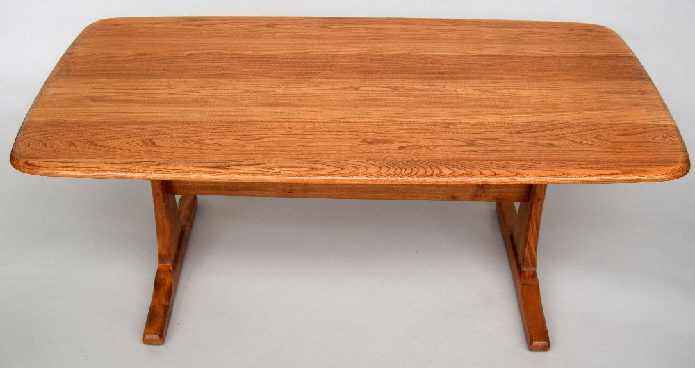 An Ercol Golden Dawn coffee table 126 x 65 x 32cm: An Ercol Golden Dawn coffee table 126 x 65 x 32cm