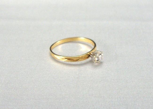 14 Kt. Diamond Solitaire with etched band: Engagement Ring Approx. Size 6; Diamond about .15 points, no appraisal, however it has been tested and is marked 14K