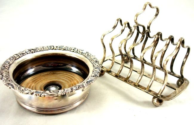 Silver Coaster and Toast Holder: Silver plated coaster and toaster!