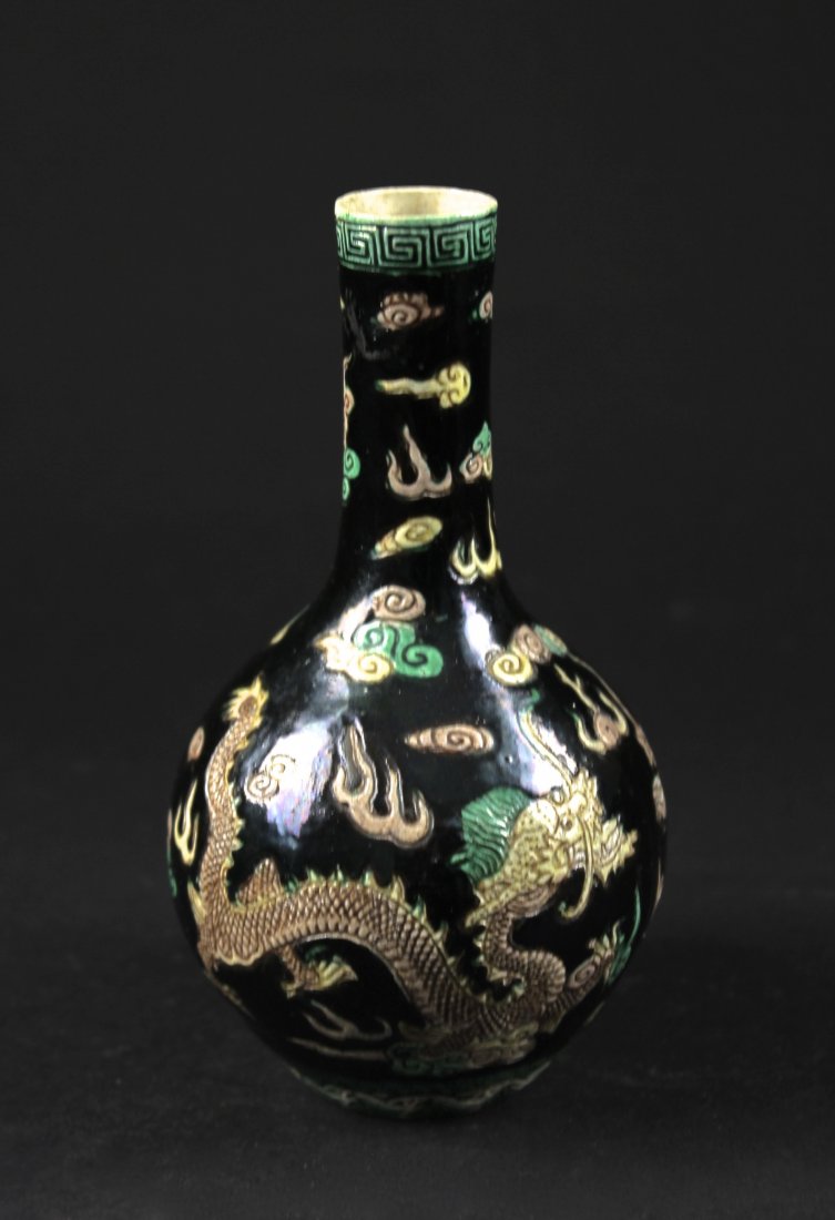 Black Glaze Wu-Cai Dragon Bottle Vase KANGXI Mark: 康熙款乌金釉贴塑黑地五彩双龙天球瓶 Height: 14.5cm