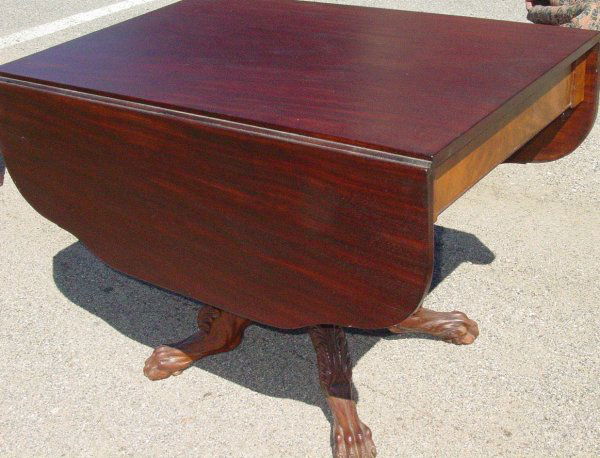 19th c. Duncan Phyfe carved mahogany drop leaf tab: 19th c. Duncan Phyfe carved mahogany drop leaf table, elaborately carved pedestal, New York origin, circa 1820, 25" x 40" x 28 1/2" plus two 14" leaves, good condition